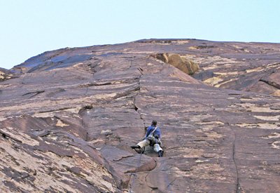 Rob Dezonia heading up into the unknown on the first ascent of Velvet Revolver, pitch 6 (5.10d), Black Velvet Wall.