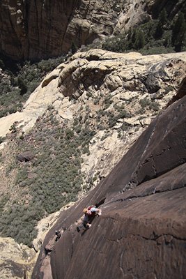 Immaculate rock and crazy exposure. Simon Peck on Pro Life (12b) on the Brownstone Wall.