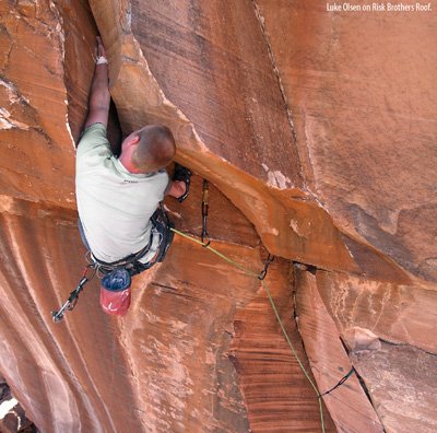 Luke Olson on Risk Brothers Roof (5.11a), Calico Basin.